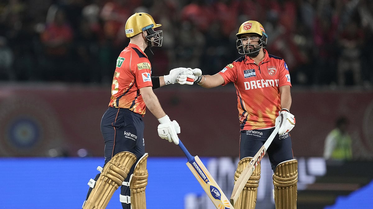 Punjab Kings Josh Inglis, left, and Punjab Kings Prabhsimran Singh. AP Photo