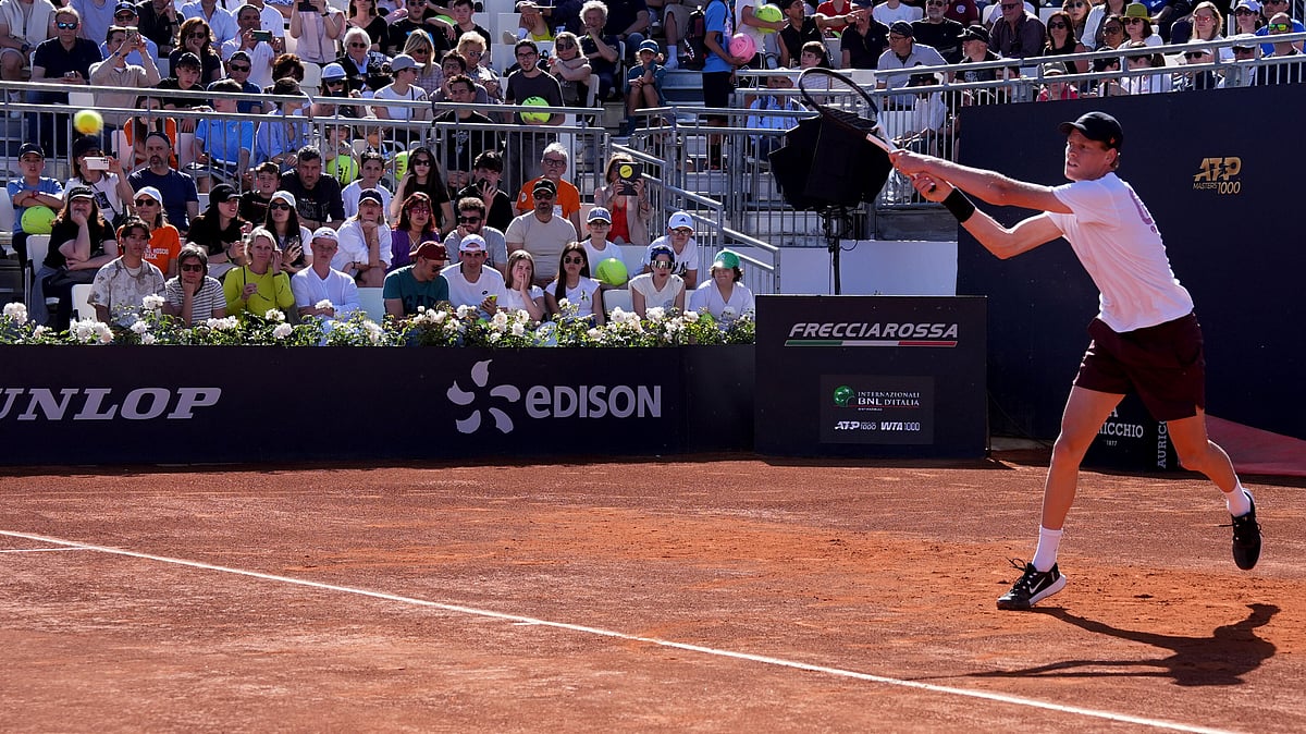  (Alfredo Falcone/LaPresse via AP)

 : Italy's Jannik Sinner practices during a training session with Lorenzo Sonego at the Foro Italico in Rome, Italy, May 6, 2025