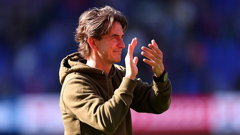 Thomas Frank applauds the travelling Brentford fans