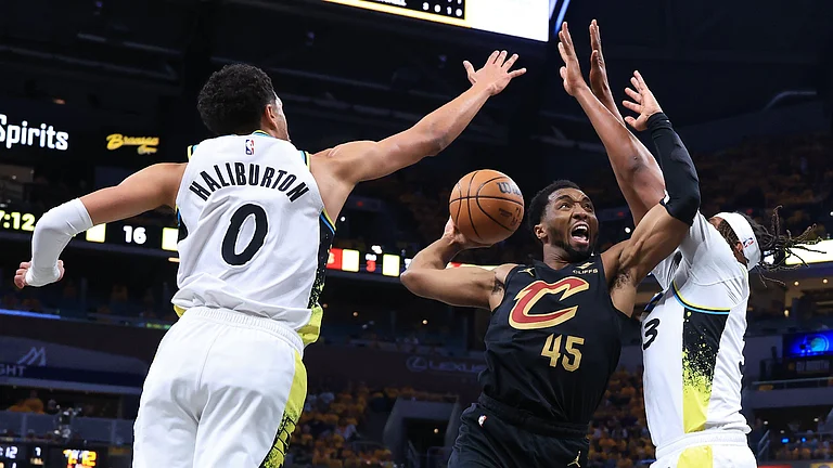 Cleveland Cavaliers' Donovan Mitchell in action. - null