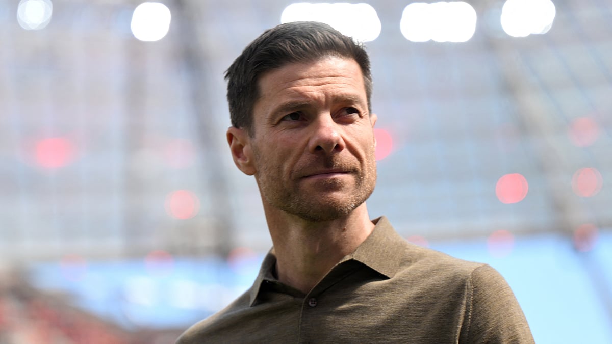 Xabi Alonso has been linked with a move to Real Madrid. - null