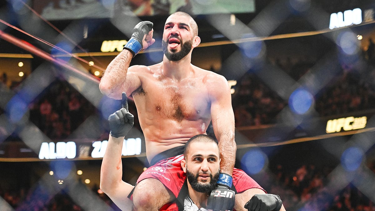 (Graham Hughes/The Canadian Press via AP)
 : Aiemann Zahabi, top, reacts following his win over Jose Aldo during their UFC 315 mixed martial arts featherweight bout in Montreal, Saturday, May 10, 2025. 
