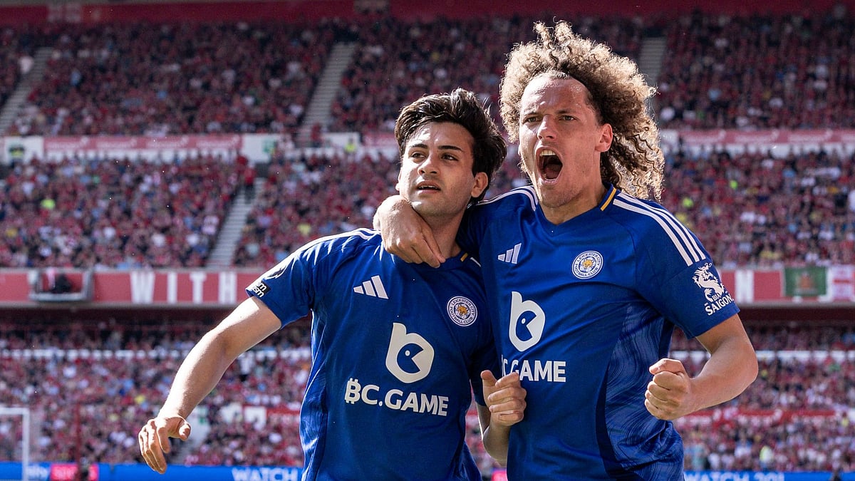 Buonanotte celebrates his equaliser with Faes. - null