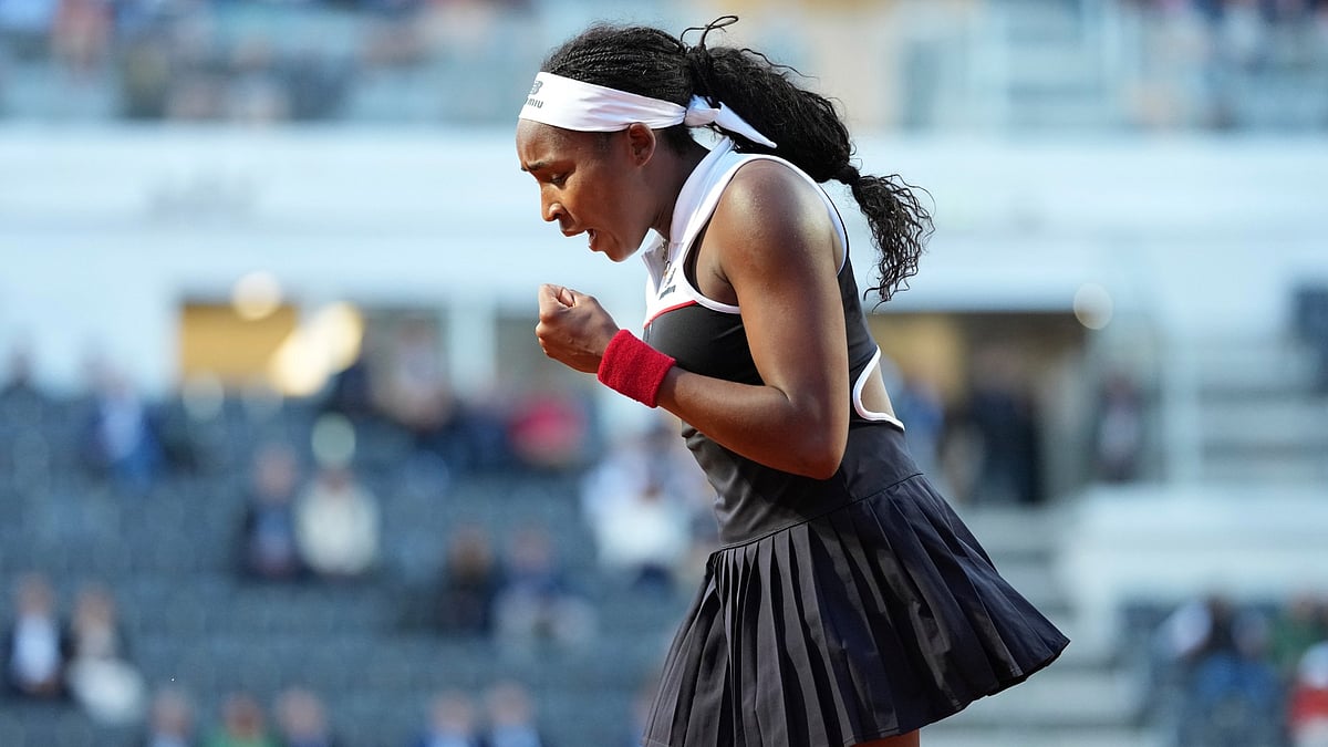 Coco Gauff celebrates after converting match point