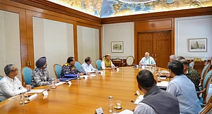 | Photo: PTI : Prime Minister Narendra Modi with Defence Minister Rajnath Singh, National Security Advisor (NSA) Ajit Doval, Chief of the Naval Staff Admiral Dinesh K Tripathi, Chief of the Air Staff Air Chief Marshal AP Singh, and others during a meeting, a day after India and Pakistan reached a bilateral understanding, in New Delhi,