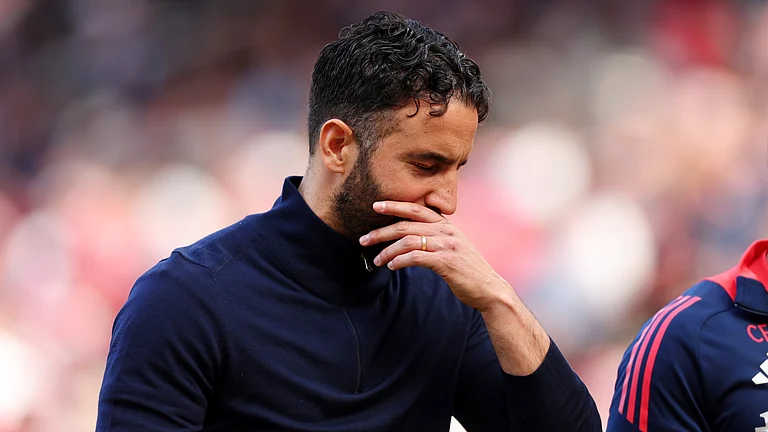 Ruben Amorim looks dejected after Manchester United's latest defeat - null