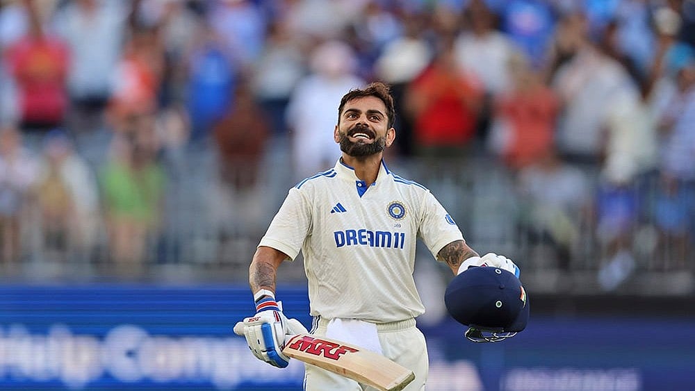 File : India's Virat Kohli celebrates his century.
