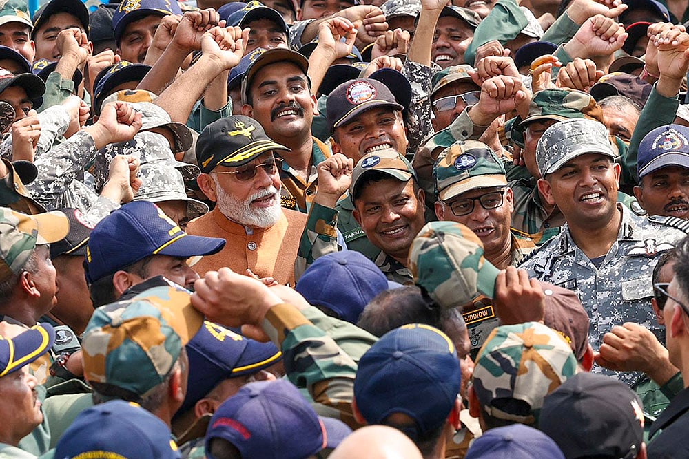 | Photo: PTI : PM Modi at Adampur air base in Punjab