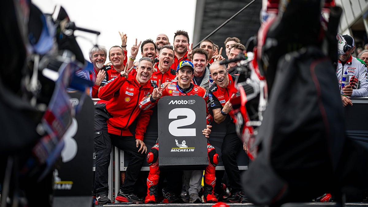| Photo: X/ducaticorse : Ducati's Marc Marquez celebrates after coming second in Le Mans French Grand Prix 2025.