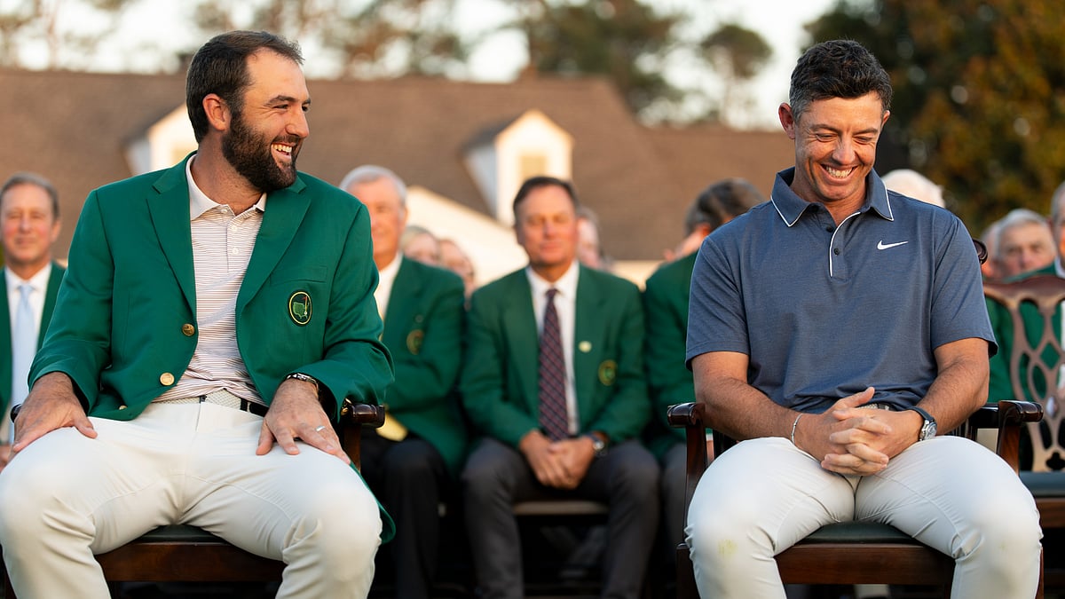 Scottie Scheffler congratulates Rory McIlroy at The Masters