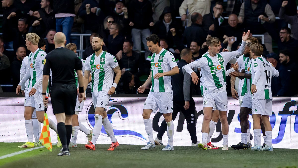 Thijmen Blokzijl is mobbed by his team-mates after scoring against Ajax