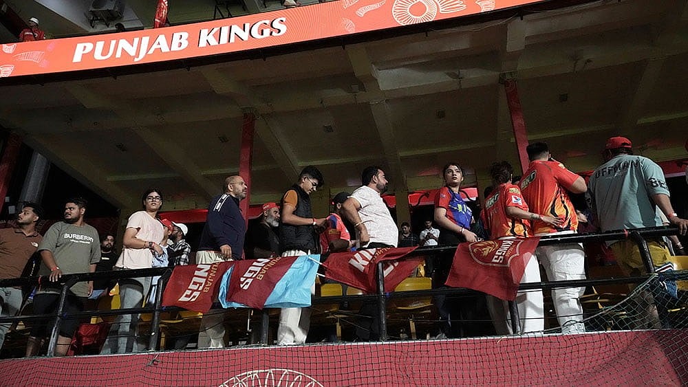 | Photo: AP/Ashwini Bhatia : Scenes as audience evacuate stadium during Indian Premier League 2025 PBKS vs DC match