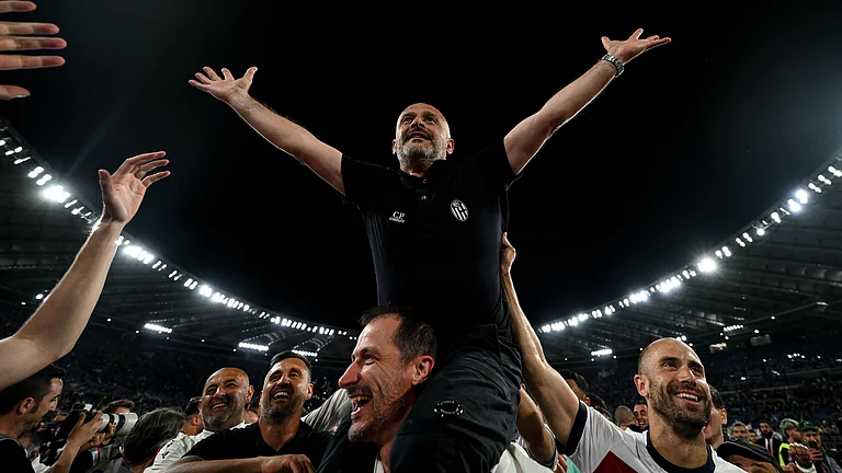 Vincenzo Italiano takes in the celebration at full-time on Wednesday. - File