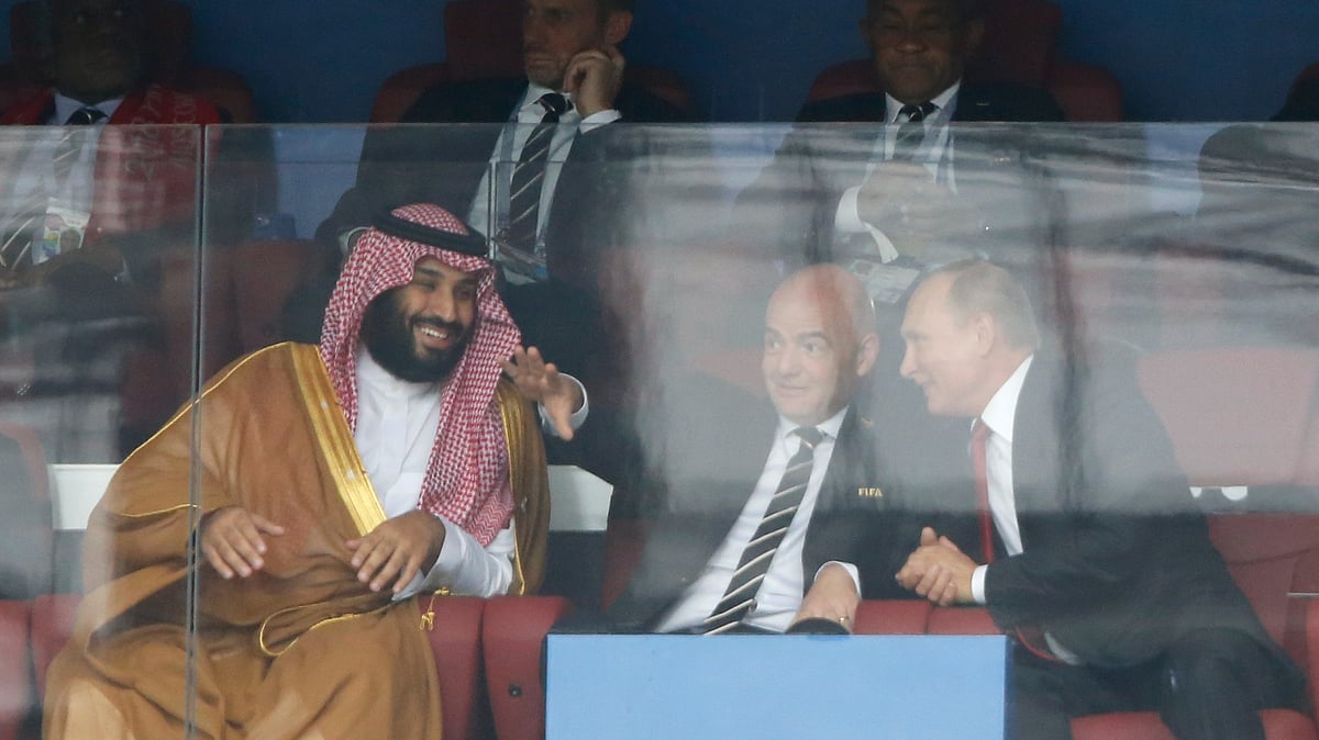 AP/Hassan Ammar, File : Saudi Arabia Crown Prince Mohammed bin Salman, left, FIFA President Gianni Infantino, center, and Russian President Vladimir Putin watch the 2018 World Cup opening match between Russia and Saudi Arabia at the Luzhniki Stadium in Moscow on June 14, 2018.