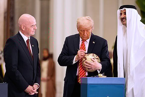Donald Trump with Qatar's Emir Sheikh Tamim bin Hamad Al Thani and Gianni Infantino 