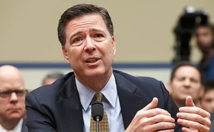 AP : Former FBI chief James Comey