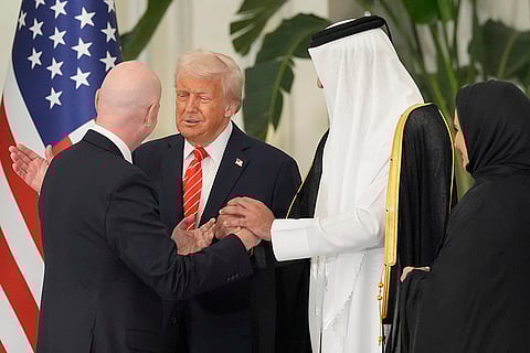 Donald Trump with Qatar's Emir Sheikh Tamim bin Hamad Al Thani and Gianni Infantino 