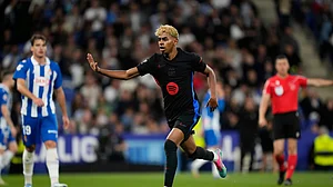 AP/Jose Breton : FC Barcelona's Lamine Yamal reacts after scoring the opener against Espanyol during their Spanish La Liga 2024-25 match at RCDE Stadium on May 15, 2025.
