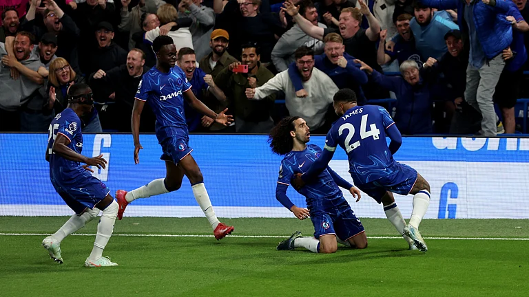 Marc Cucurella celebrates his goal against Manchester United - null