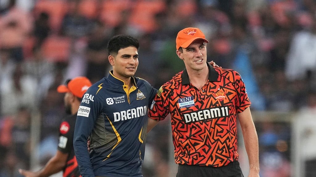 AP : Gujarat Titans' captain Shubman Gill, left, and Sunrisers Hyderabad's captain Pat Cummins before the Indian Premier League cricket match.
