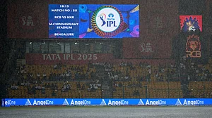 AP/Aijaz Rahi : A digital sign displays match details as It rains heavily shortly before the scheduled start of the Indian Premier League cricket match between Kolkata Knight Riders and Royal Challengers Bengaluru at Chinnaswamy Stadium in Bengaluru, India, Saturday, May 17, 2025.