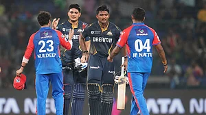 | Photo: AP/Manish Swarup : Gujarat Titans' captain Shubman Gill teammate Sai Sudharsan are congratulated by Delhi Capitals' Kuldeep Yadav T. Natarajan after the IPL 2025 match.