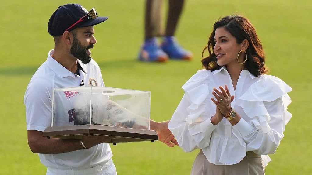 File/AP : India's Virat Kohli poses with his wife Anshuka Sharma during the facilitation ceremony of Kohli for his 100th Test ahead.
