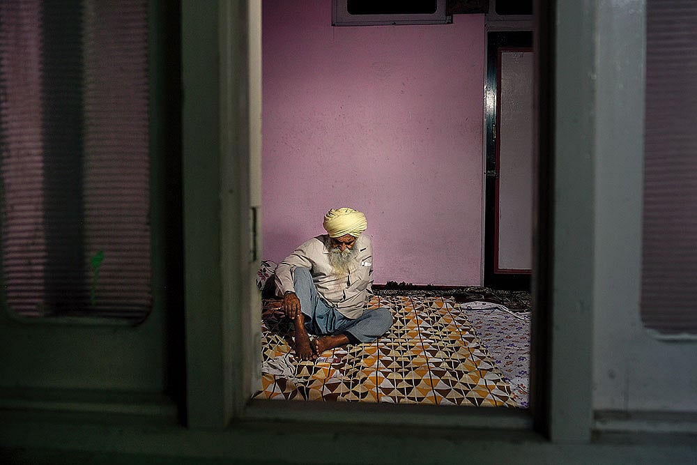 Shattered: Father of Ranjeet Singh, who died due to shelling from across the LoC on May 7, in Poonch - | Photo: Yasir Iqbal