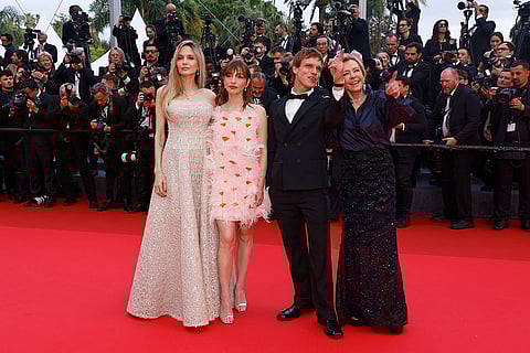 Cannes 2025 Day 4: Angelina Jolie, Marie Colomb, Finn Bennett and Caroline Scheufele during Eddington premiere