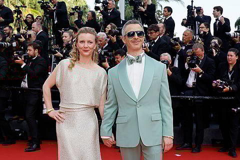 Cannes 2025, Day 6: Emma Wall and Jeremy Strong during The Phoenician Scheme premiere