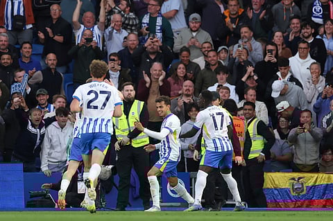 Brighton's Yasin Ayari, centre, celebrates after scoring his side's opening goal during the English Premier League soccer match between Brighton and Liverpool at American Express Stadium in Brighton, England, Monday, May 19, 2025. 


