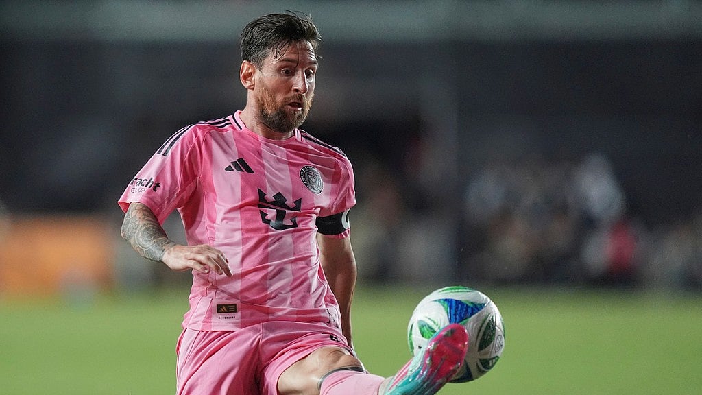 Inter Miami forward Lionel Messi (10) controls the ball during the second half of an MLS soccer match against Orlando City - AP/Rebecca Blackwell