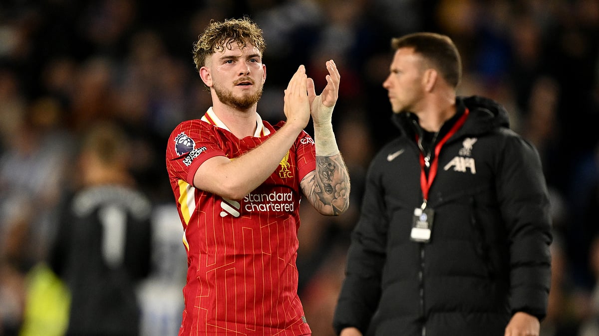Harvey Elliott applauds Liverpool's fans following Monday's loss at the Amex Stadium