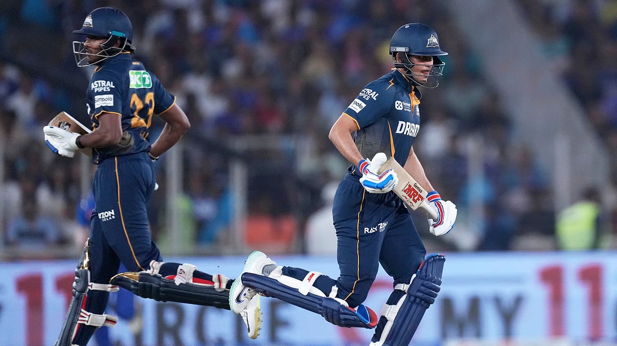 (AP Photo/Ajit Solanki)
 : Gujarat Titans' captain Shubman Gill, right, and batting partner Sai Sudharsan run between the wickets to score during the Indian Premier League cricket match between Gujarat Titans and Mumbai Indians at Narendra Modi Stadium in Ahmedabad, India, Saturday, March 29, 2025. 

