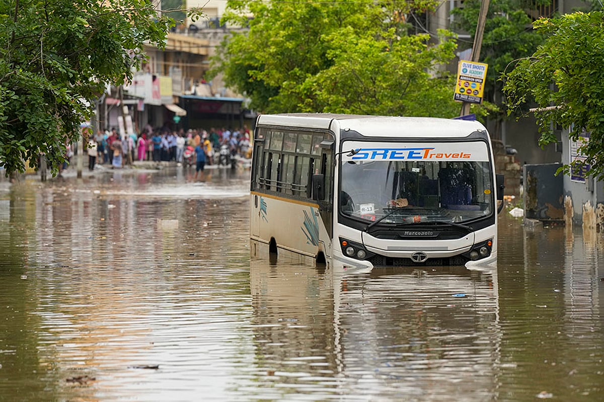 Bengaluru weather Heavy Rain 100mm Rainfall Floods the City