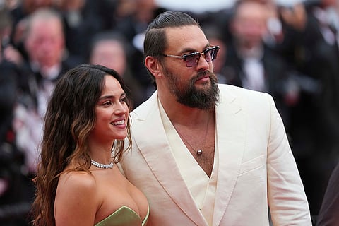 Cannes 2025, Day 7: Adria Arjona and Jason Momoa during Highest 2 Lowest premiere