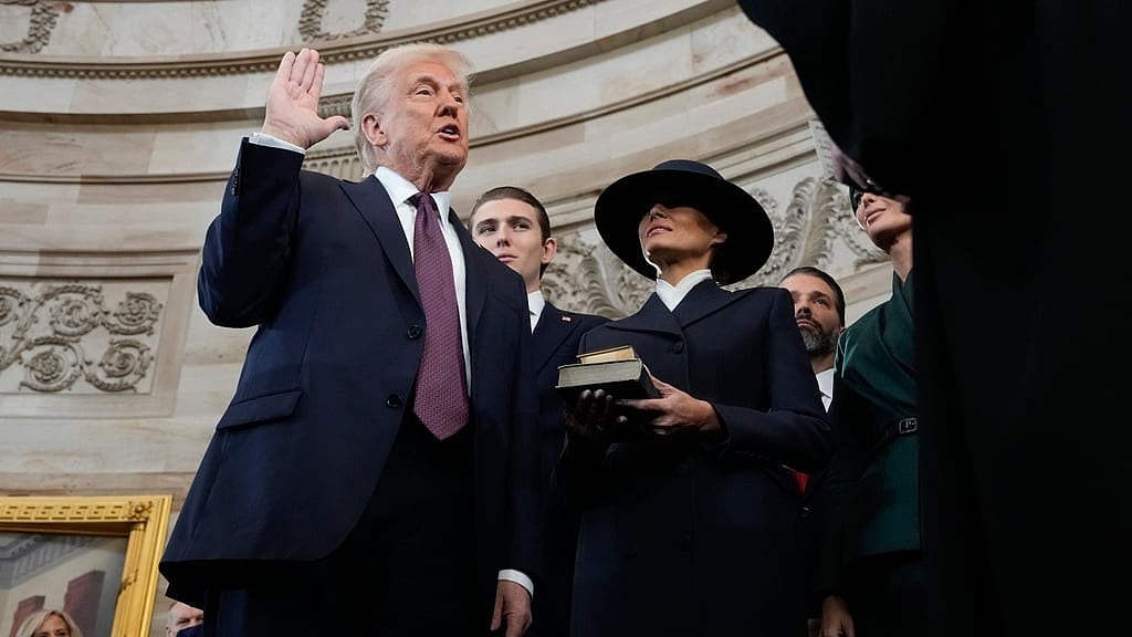 | Photo: AP : Melania Trump as Donald Trump takes oath