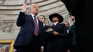 | Photo: AP : Melania Trump as Donald Trump takes oath