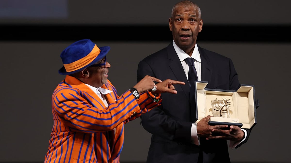 AP : Denzel Washington receives Honorary Palme d’Or from Spike Lee at Cannes 2025