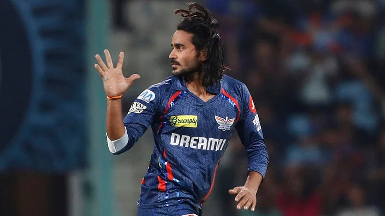 Lucknow Super Giants' Digvesh Rathi celebrates the dismissal of Sunrisers Hyderabad's Abhishek Sharma - AP