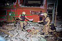 Operation Sindoor: How India Rewrites Its War Doctrine | Photo: AP : Strike Back: Soldiers inspect a building damaged by an Indian missile attack near Muzaffarabad in Pakistan-occupied Kashmir on 
May 7, 2025