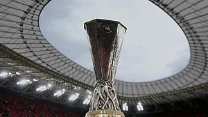 Photo: AP : The Europa League trophy is displayed on the pitch before the final match between Tottenham Hotspur and Manchester United at the San Mames Stadium in Bilbao, Spain.