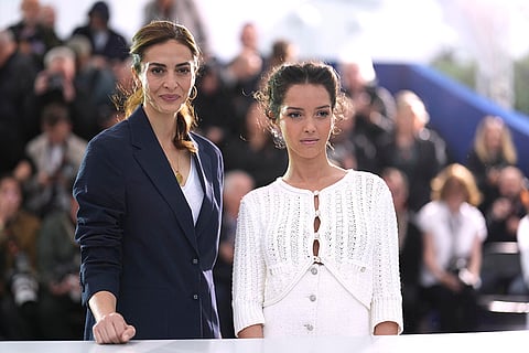 Cannes 2025, Day 8: Zineb Triki and Lyna Khoudri during Eagles of the Republic photo call