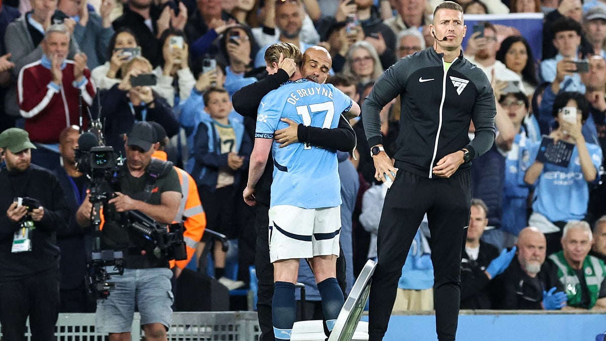 Kevin De Bruyne and Pep Guardiola during the match against AFC Bournemouth. - File