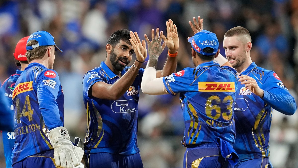 Mumbai Indians' Jasprit Bumrah, center, celebrates the dismissal of Delhi Capitals' Tristan Stubbs during the Indian Premier League cricket match between Mumbai Indians and Delhi Capitals at Wankhede Stadium in Mumbai, India, Wednesday, May 21, 2025.


 -  (AP Photo/Rajanish Kakade)