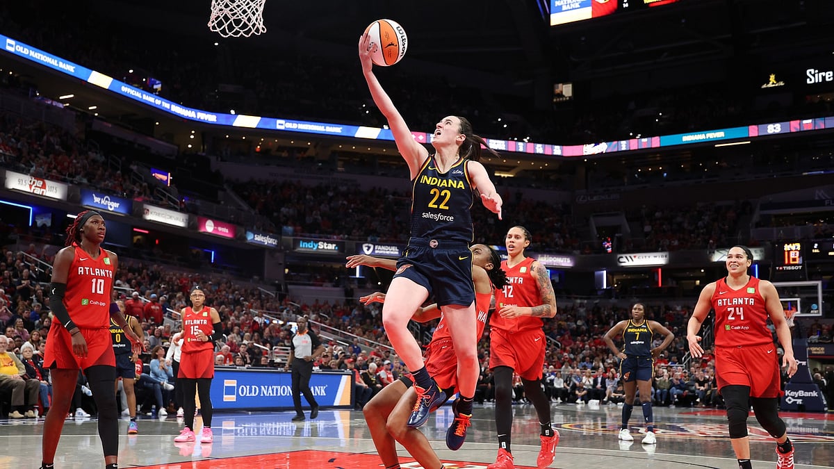 File : Caitlin Clark #22 of the Indiana Fever shoots the ball during the game against the Atlanta Dream at Gainbridge Fieldhouse on May 20, 2025 in Indianapolis, Indiana.
