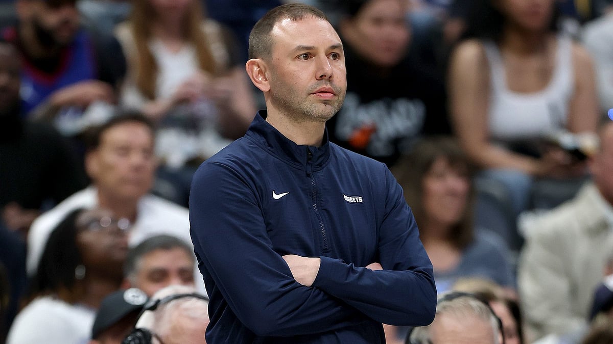 The Denver Nuggets have promoted interim coach David Adelman to full time.