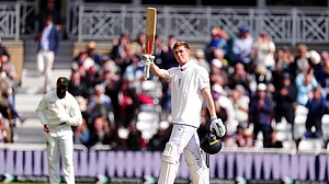 Mike Egerton/PA via AP : England's Zak Crawley celebrates his century on day one of the International test series cricket match between England and Zimbabwe at Trent Bridge, Nottingham, England.