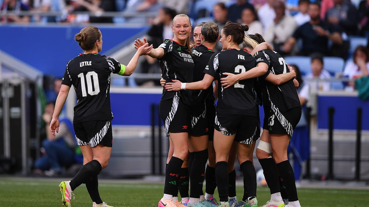 Arsenal celebrate their win over Lyon in the Champions League semi-finals