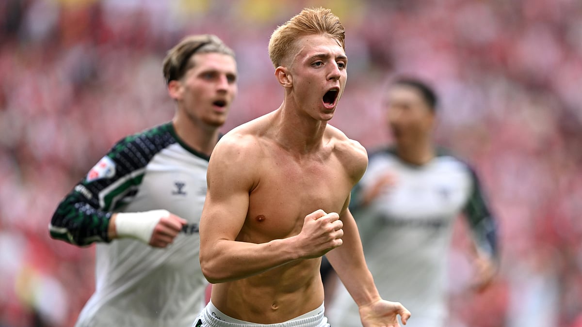 Tom Watson celebrates his goal in the Championship play-off final